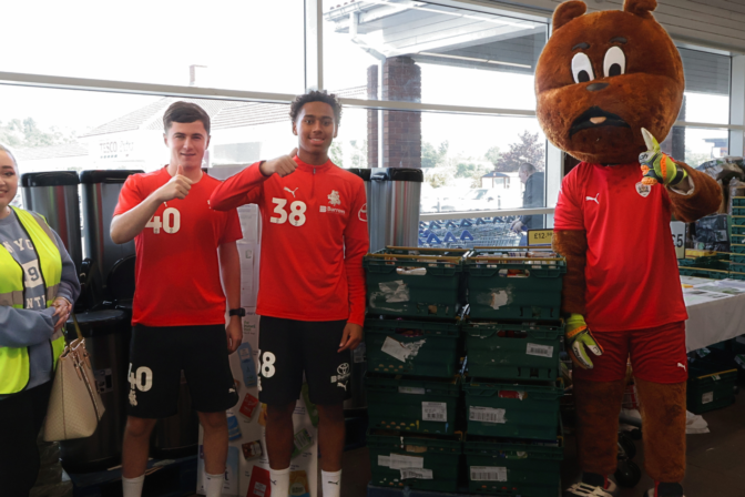 Barnsley FC players and Barnsley FC Community Trust students celebrate Barnsley Foodbank on National Foodbank Day!