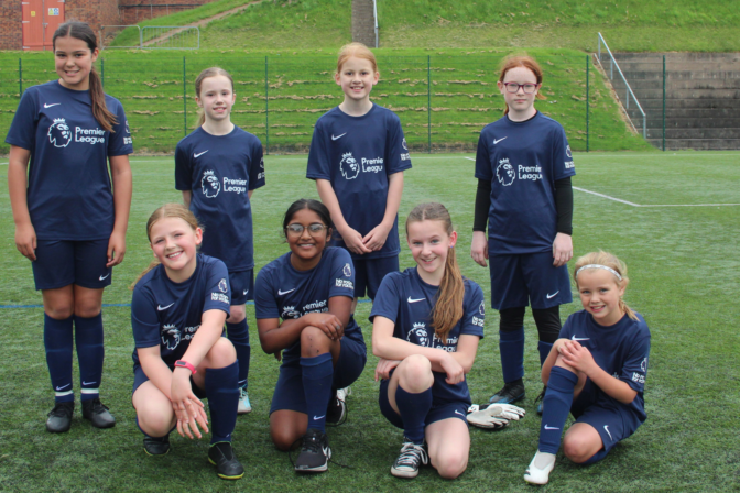 Premier League football kit gifted to girls by Barnsley FC Community Trust